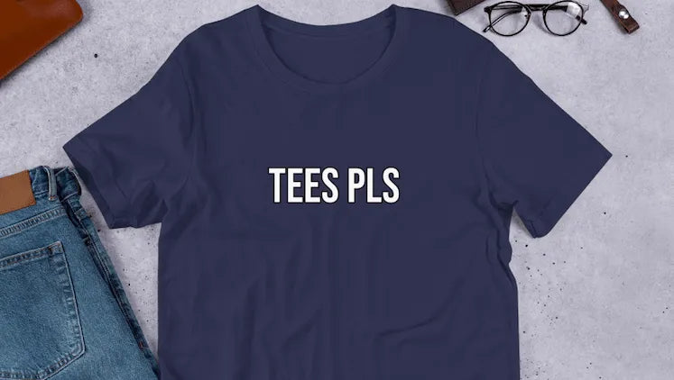 Navy flatlay t-shirt that says Tees Pls